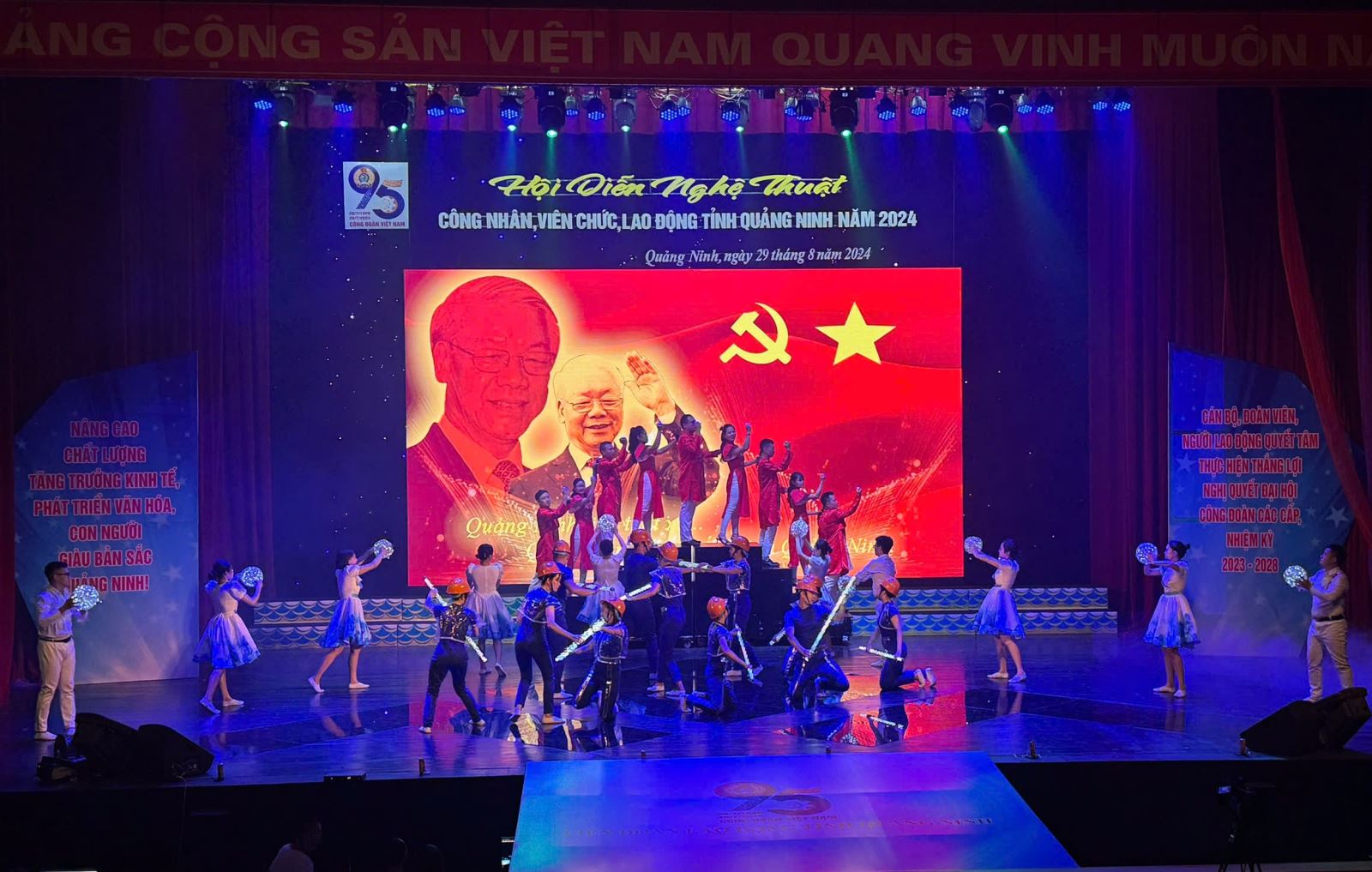 A group of people on a stageDescription automatically generated